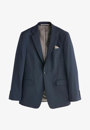 Blazer bleu marine à rayures, avec revers en pointe, deux poches avant et une poche poitrine. Intérieur doublé en gris clair, avec des poignets boutonnés.