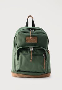 green jansport right pack Mini Expressions Bag making it a practical choice for daily use JanSport Right Pack Classic Backpack