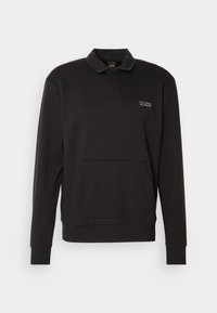 Sweat polo noir à manches longues avec col, poche kangourou sur le devant, poignets côtelés et petit logo "BOSS" sur la poitrine.