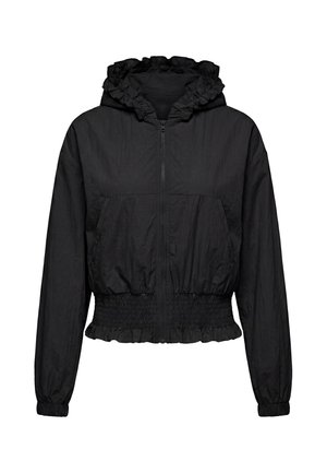 Giacca leggera nera con cappuccio arricciato, zip frontale completa, polsini elastici e vita elasticizzata arricciata con orlo a volant.