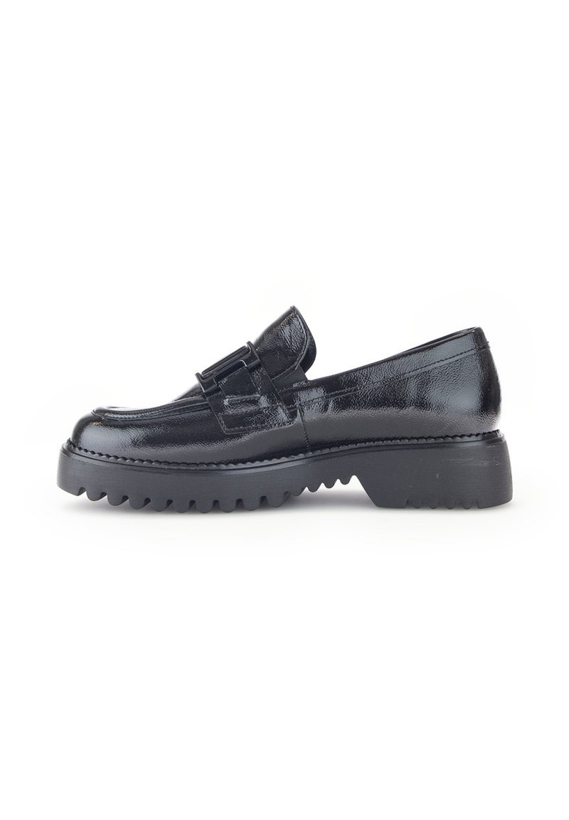 Black patent leather loafer with a decorative buckle, round toe, and chunky, ridged sole for enhanced grip and durability.