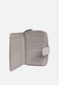 Wallet in light gray leather with a zip closure. Six card slots, a snap button, and embossed text reading "today is a good day."