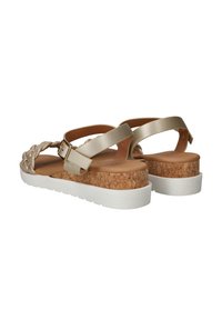 Gouden gevlochten bandensandalen met een kurken platform, witte rubberen zool en verstelbare enkelband voor een veilige pasvorm.