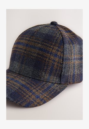 Wełniana czapka z daszkiem w niebiesko-szarą kratę, z zaokrągloną koroną, zakrzywionym daszkiem i fakturowanym materiałem o miękkim wykończeniu.
