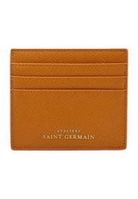 Porte-cartes en cuir orange texturé avec quatre fentes pour cartes et lettrage doré en relief "Ateliers Saint Germain" en bas.