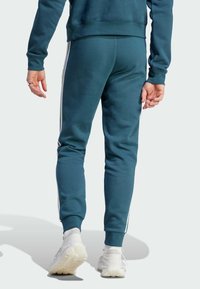 adidas Originals 3-STRIPES - Spodnji deli trenirk - arctic night