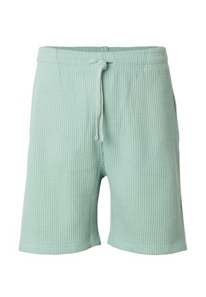 Lysegrønne teksturerede stofshorts med elastik i taljen og snøre, knælange, designet til afslappet brug.