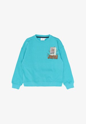 Turquoise sweatshirt with a crew neck, ribbed cuffs, and hem. Features a graphic of a vending machine with the text "Fun food is my fuel."