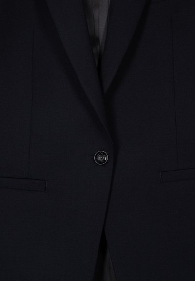 Navy blazer with a single black button, notched lapels, and two front pockets; made from textured fabric, with a smooth interior lining.