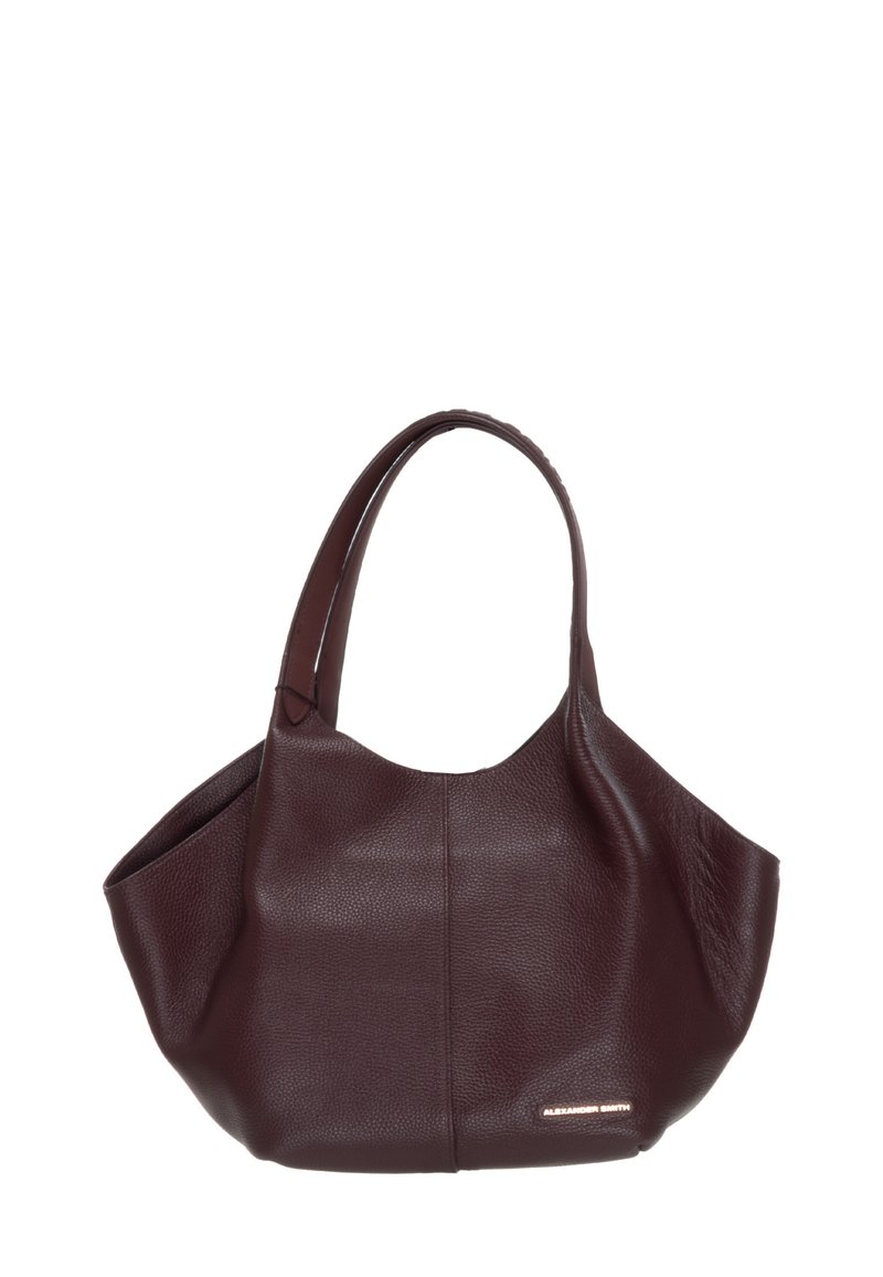 Borsa a spalla in pelle marrone con una texture morbida, forma arrotondata e manici lunghi. Presenta un piccolo logo metallico sul lato.