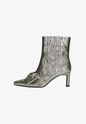 Silver metallic ankle boot with a pointed toe, gathered detail at the front, textured finish, and a mid-height block heel.