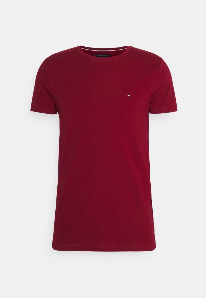 Plain dark red short-sleeve crew neck T-shirt with a small Tommy Hilfiger logo on the left chest.