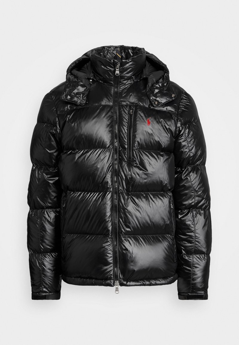 Black shiny puffer jacket with detachable hood, front zipper, chest zip pocket, and red embroidered logo on the left chest.