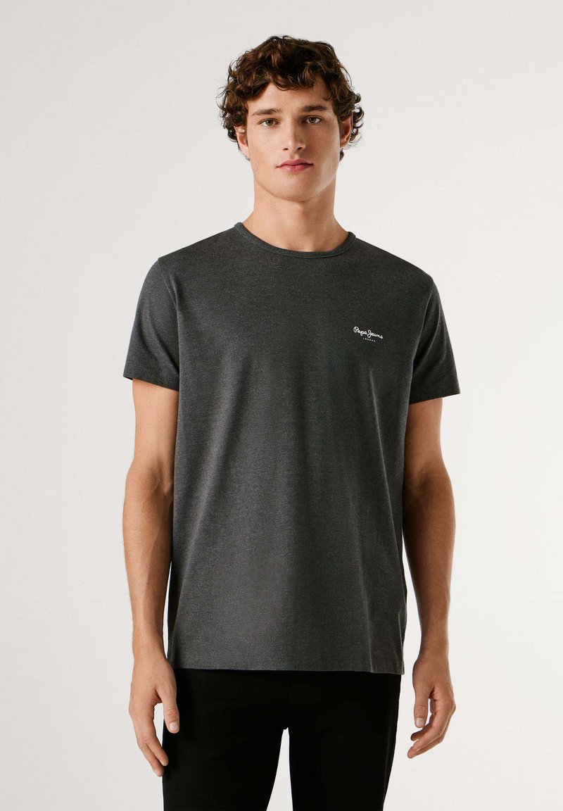 Temno siva majica s kratkimi rokavi iz bombažne tkanine, z okroglim izrezom in majhnim belim logotipom na levi strani prsnega koša.