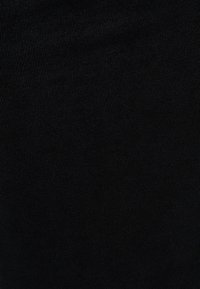 Black ribbed fabric with a fine texture, featuring vertical lines. The material appears stretchy and is consistent in color throughout.