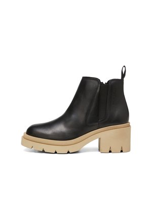 Schwarze Leder-Stiefeletten mit einem kräftigen beigen Absatz und Gummisohle, ausgestattet mit elastischen Seitenpanelen und einer Zuglasche an der Rückseite.