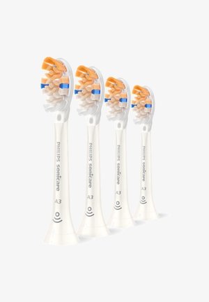 Philips Sonicare A3 toothbrush replacement heads; white plastic with orange and blue bristles, designed for efficient cleaning. Four units visible.