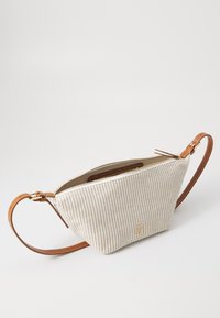 Tommy Hilfiger PREMIUM BEACH SLING BAG - Sac à main - beige