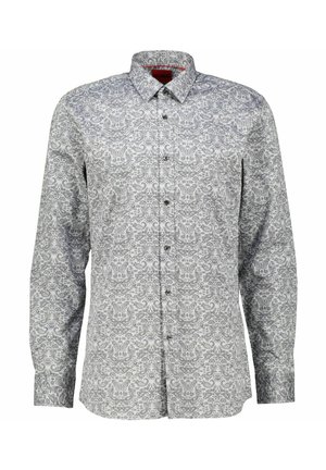 Chemise à manches longues boutonnée avec base blanche et motif cachemire gris complexe, avec un col classique et des boutons noirs à l'avant.