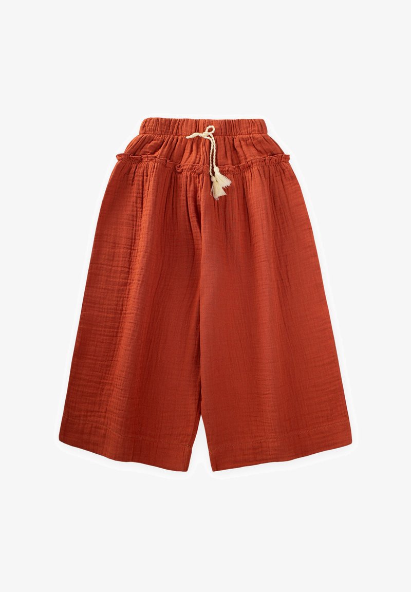 Rudai spalvos plačiakojai kelnių pagaminti iš tekstūruoto audinio, su elastine juosta ir raišteliu bei dekoratyviniu kutu.