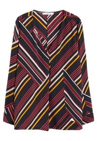 Blouse à manches longues noire avec un motif géométrique de rayures rouges, jaunes et crème de différentes tailles. Dotée d'un col en V et d'une coupe décontractée.