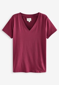 Tricou din bumbac bordeaux cu mânecă scurtă și decolteu în V, cu cusături vizibile și eticheta de îmbrăcăminte în interiorul gâtului.