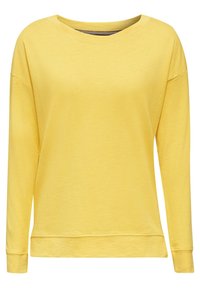 Sweat-shirt jaune à manches longues avec col rond, fabriqué en coton doux. Dispose d'une coupe décontractée et de poignets et ourlet côtelés.