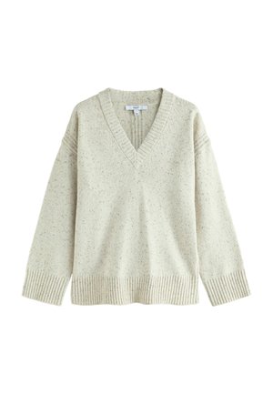Kremfarvet strikket sweater med V-hals, ribkanter på ærmer og bund, med et diskret plettet mønster over det hele.