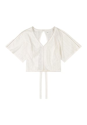 Balta mežģīņu īsa blūze ar plātām īsām piedurknēm, V veida kakla izgriezumu, atpakaļ atvērtu caurumu un gariem saišu galiem, kas karājas no apakšmalas.