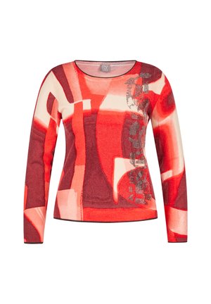 Long-sleeve women's sweater with round neck, abstract red, orange, and cream geometric pattern, and decorative silver studs on front right side.