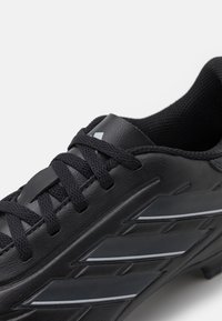 adidas Performance Scarpe da calcio per terreni duri - black