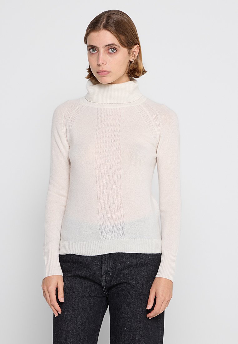 Hellbeige Rollkragenpullover mit strukturiertem Strickmuster und gerippten Bündchen. Verfügt über eine taillierte Silhouette und einen weichen, gemütlichen Stoff.