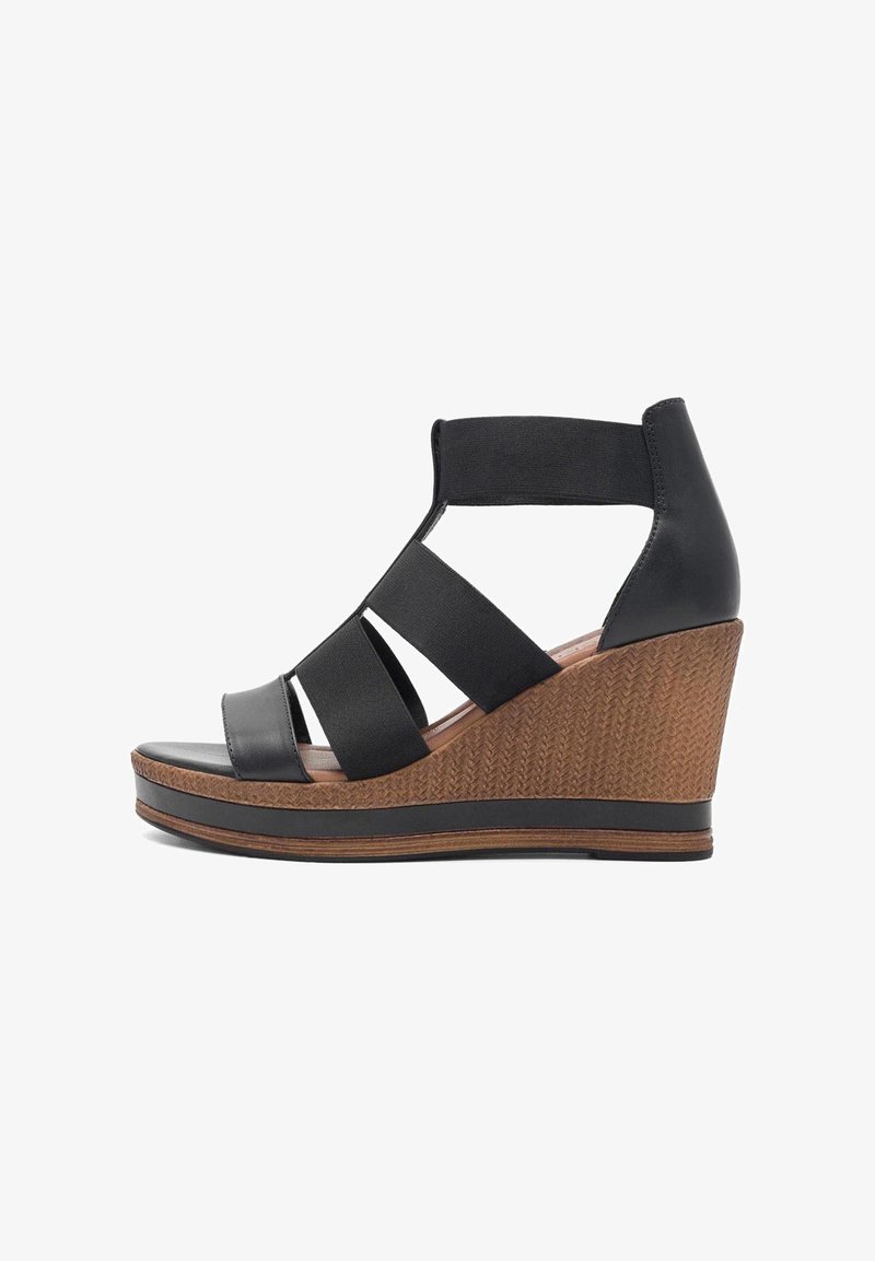 Juodos platforminės basutės su atvira nosimi, elastingomis juostelėmis ir tekstūruota ruda platforma. Lygus odinis viršus su sluoksniuotu kulno dizainu.