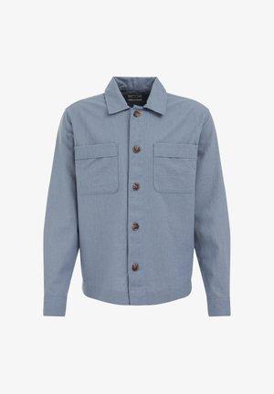 Jasnoniebieska, długorękawowa kurtka z tkaniny tkanej. Posiada zapięcie na guziki, dwie kieszenie na piersiach oraz brązowe guziki. Klasyczny krój kołnierza.