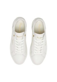 White sneakers made of smooth material with a lace-up design, featuring gold logo accents, rounded toe, and flat rubber sole.
