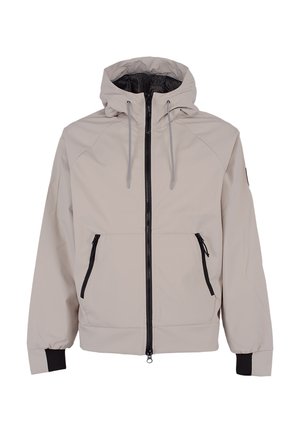 Giacca impermeabile beige chiaro con cappuccio, zip nera, due tasche frontali, polsini elasticizzati e fodera in rete. Presenta un design semplice.