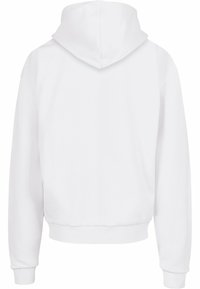 Biała, krótka bluza z kapturem ozdobionym sznurkiem, długimi rękawami, ściągaczami na mankietach oraz miękką teksturą. Brak widocznych logo lub wzorów z tyłu.