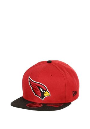 Red baseball cap with black visor, featuring an embroidered Cardinals logo on the front and a smooth fabric texture.