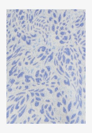 Lichte stof in het wit met een bloemmotief in verschillende tinten blauw. De textuur is zacht en iets harig, wat het ontwerp versterkt.