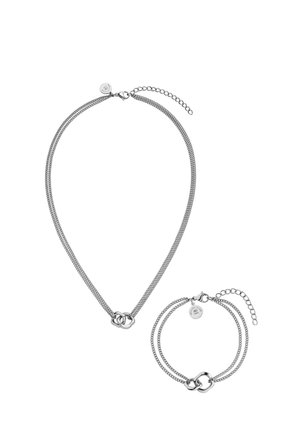 Silver chain necklace and matching bracelet set with double-link design and adjustable clasps on a white background.