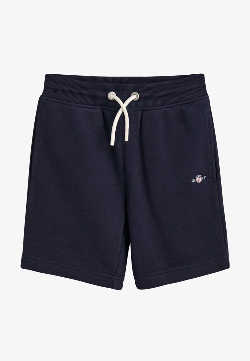 Shorts décontractés bleu marine avec ceinture élastique, cordon blanc, poches latérales et petit logo GANT sur la cuisse gauche.