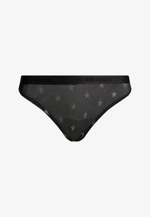 Tanga em rede preta com padrão de estrelas por toda a parte e um acabamento texturizado. Apresenta uma cintura sólida preta com o nome da marca em relevo.