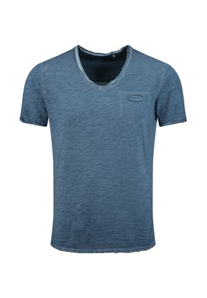 Kurzärmliges V-Ausschnitt-T-Shirt in verblasstem Blau mit denimähnlicher Textur. Verfügt über eine kleine Brusttasche und Fransenabschlüsse.