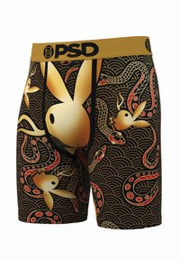 Boxer neri con una fascia in vita dorata, decorata con un motivo a onde e raffigurazioni stilizzate di conigli e serpenti in tonalità rosse e dorate.