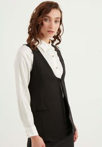 Herita SLEEVELESS WITH POCKETS - Väst - black