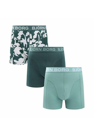 Three men's boxer briefs in green shades: solid dark green, light green, and green-white camouflage, all with Björn Borg branded waistbands.
