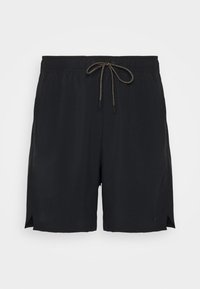 Shorts de bain noirs en tissu léger, dotés d'une taille à cordon avec des accents dorés et des fentes latérales pour une meilleure mobilité.