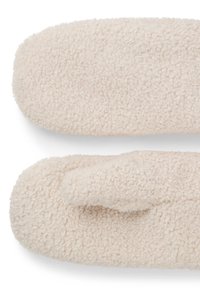 Moufles en polaire couleur crème avec une surface douce et texturée, dotées d'une section pour le pouce, conçues pour la chaleur et le confort.