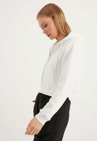 Herita Tröja med dragkedja - off white