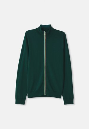 Gilet zippé vert avec un col haut, comportant une rayure multicolore le long de la fermeture éclair, des poignets côtelés et une texture lisse.